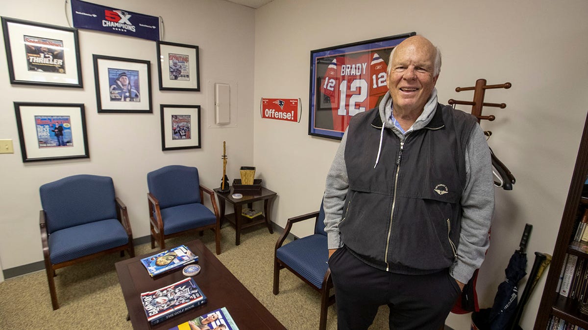 Tom Brady Sr poses with Patriots figures