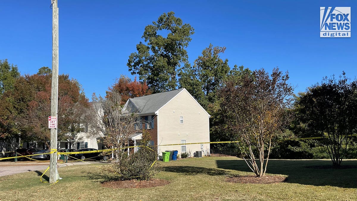 raleigh north carolina with police tape surrounding a home