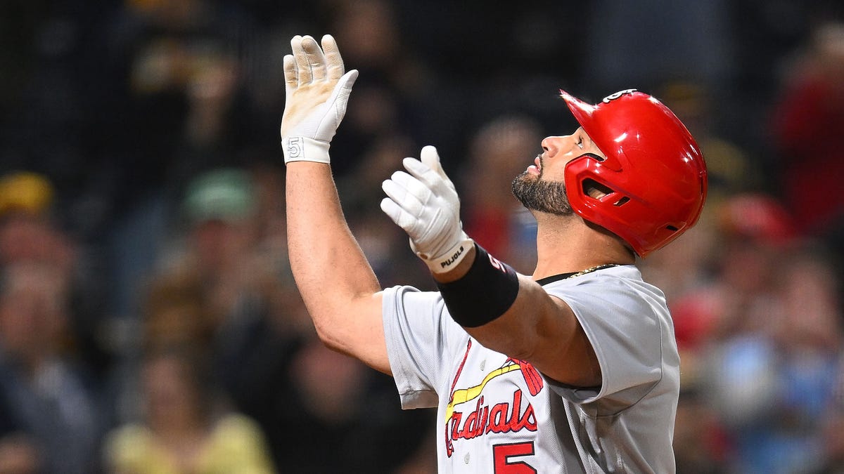 Albert Pujols looks at sky