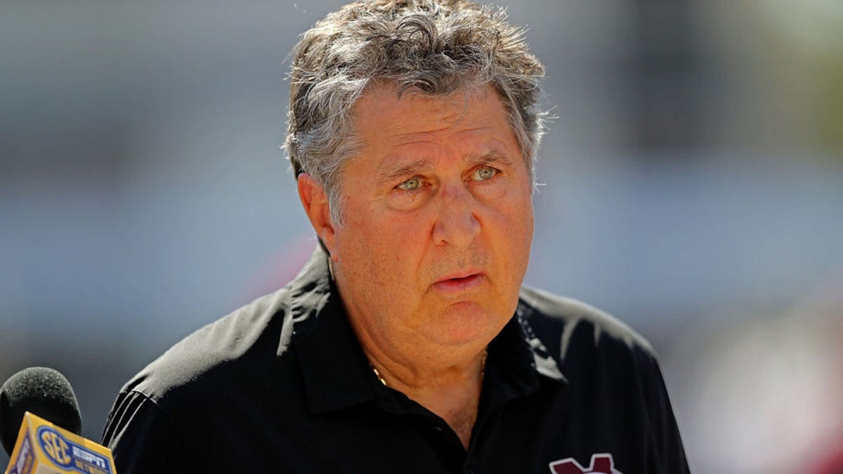 Mike Leach looks on during game