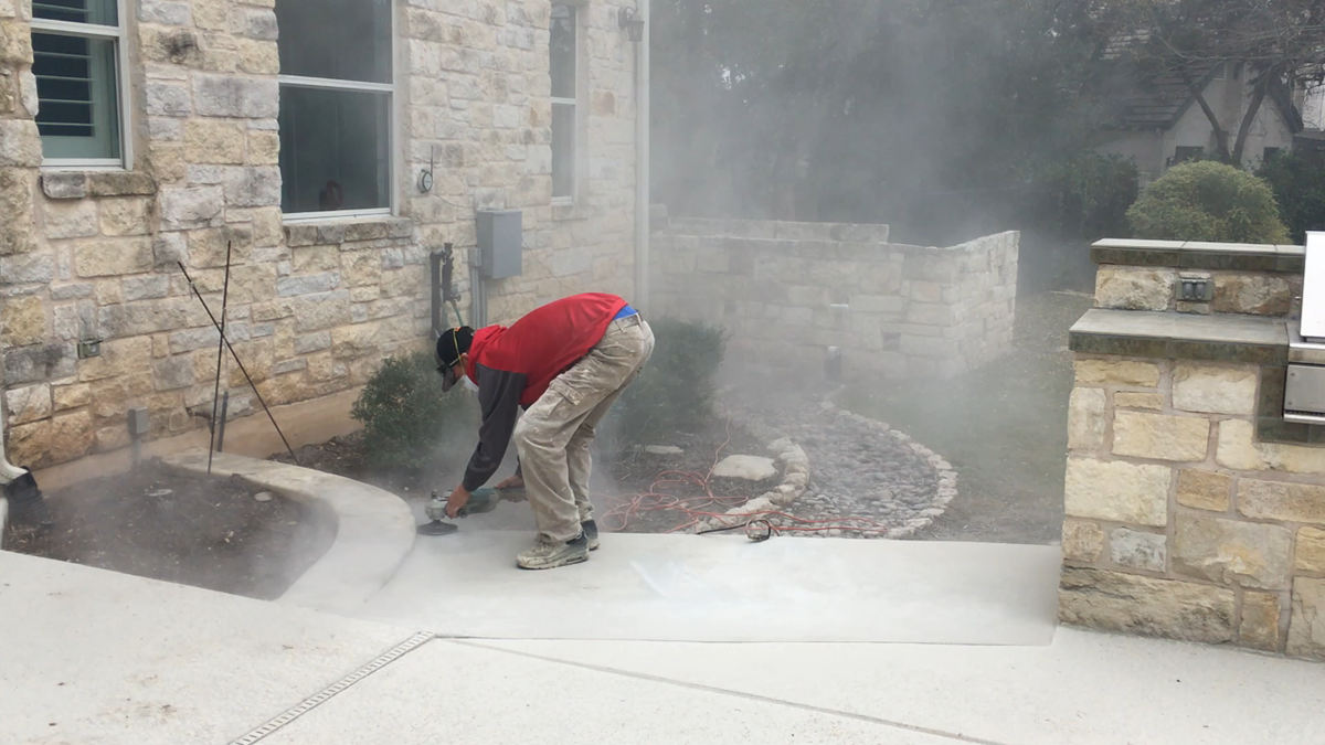 Christopher Branham working on concrete