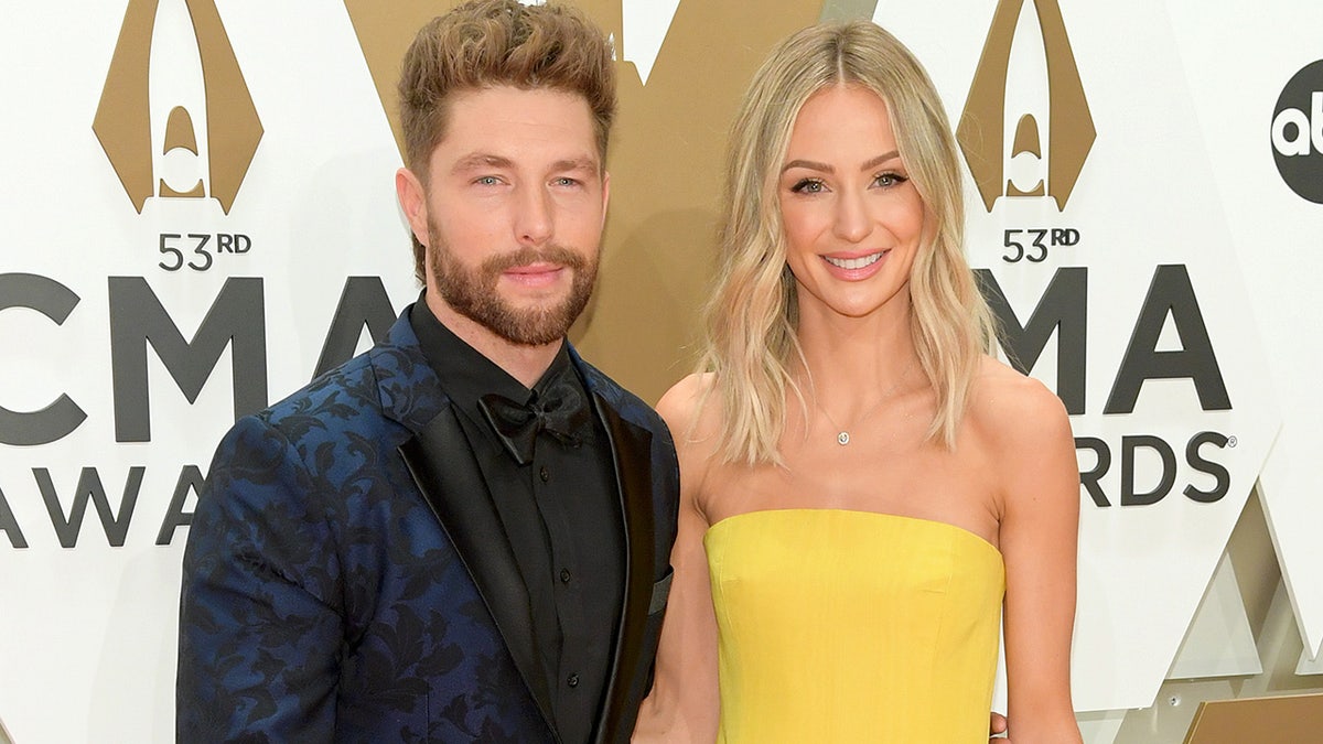 Chris Lane and Lauren Bushnell attend CMA Awards in 2019