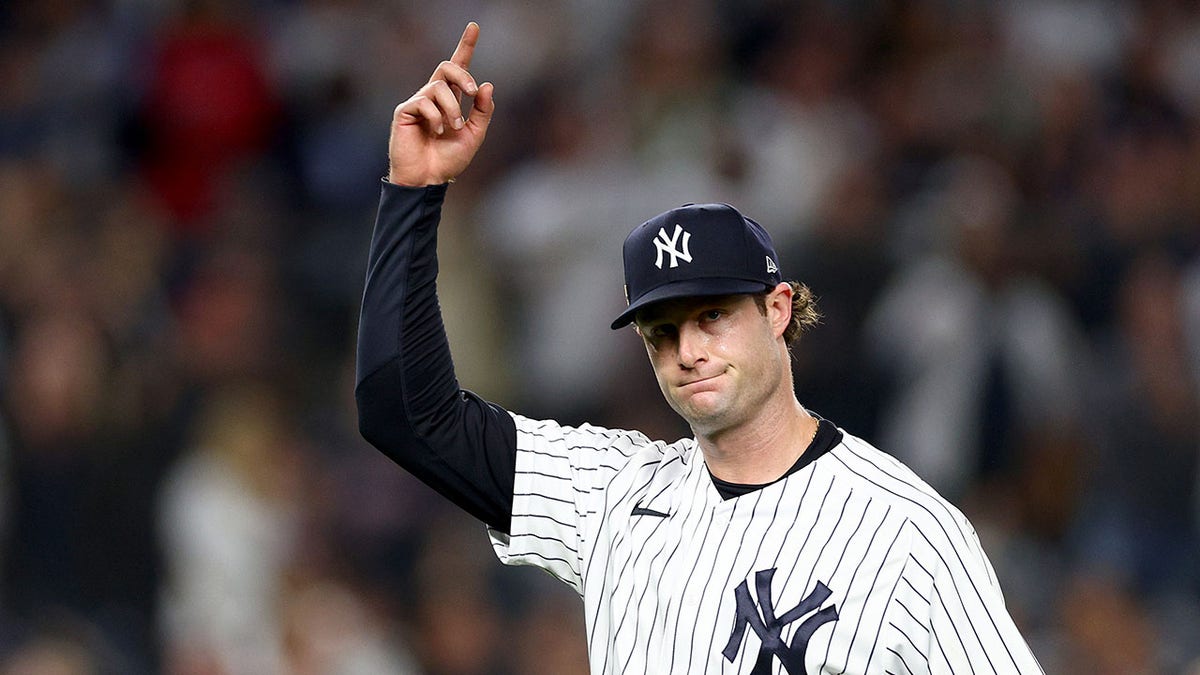 Gerrit Cole gestures to crowd