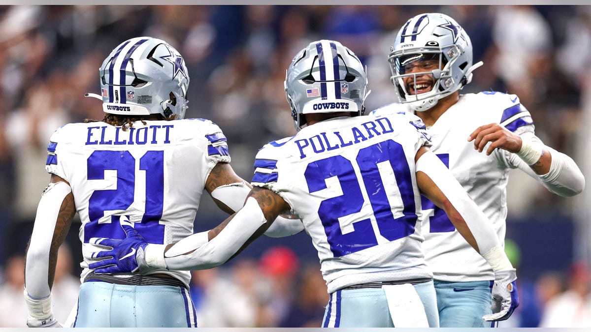 Dak Prescott, Tony Pollard and Ezekiel Elliott meet on field