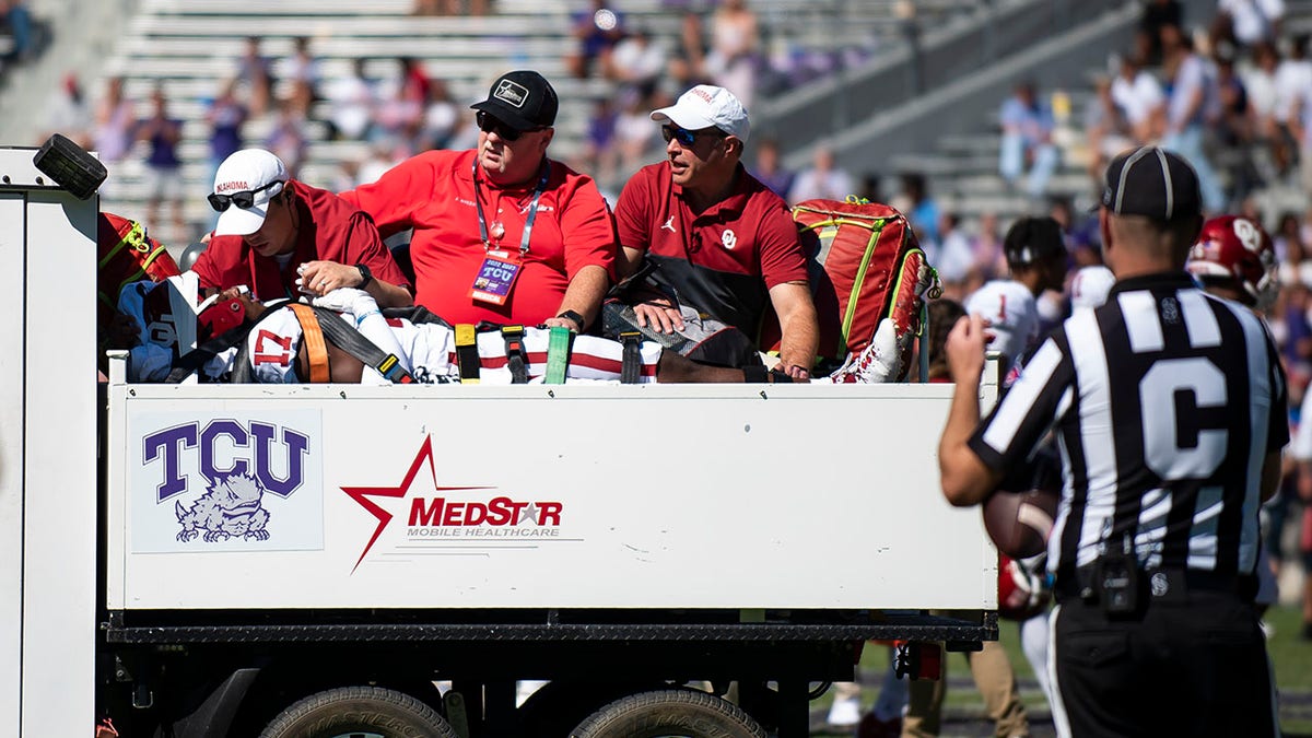 Damond Harmon carted off