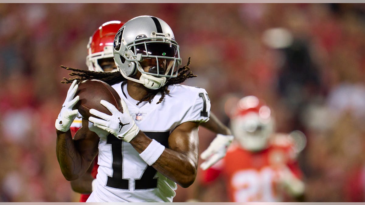 Davante Adams #17 of the Las Vegas Raiders catches a touchdown pass against the Kansas City Chiefs during the first half at GEHA Field at Arrowhead Stadium on October 10, 2022 in Kansas City, Missouri.