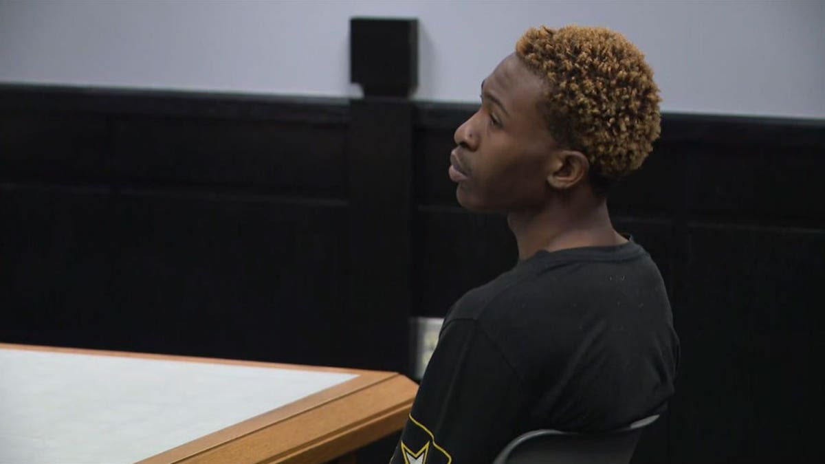 Kemare Bryan sits in court
