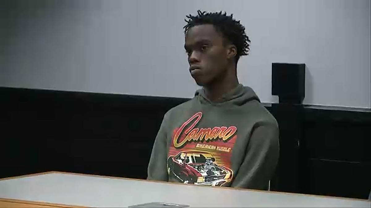 Chandler Richardson sits in court