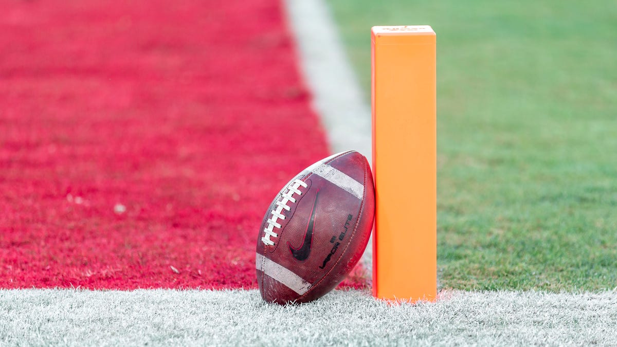 Football sitting on pylon