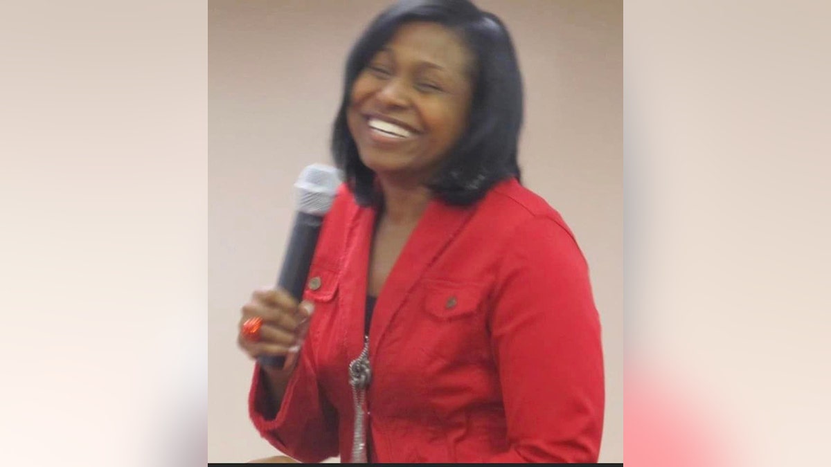georgia pastor's wife with microphone