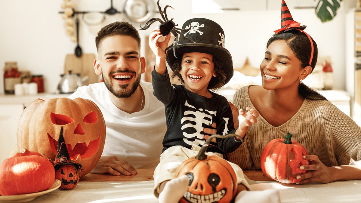 family celebrating Halloween