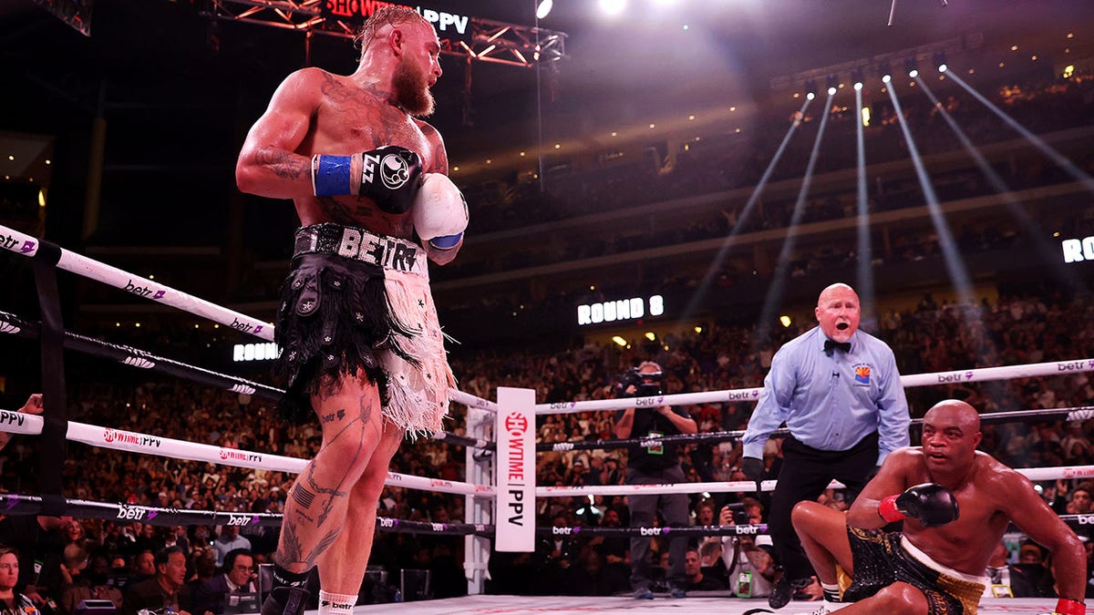 Jake Paul watches Anderson Silva fall