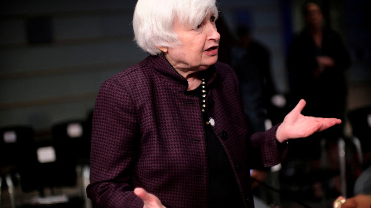 Janet Yellen hands up