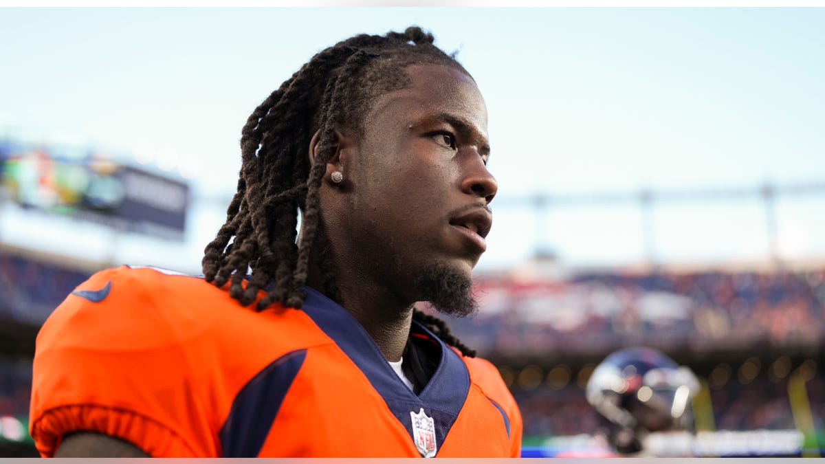 Jerry Jeudy looks on field