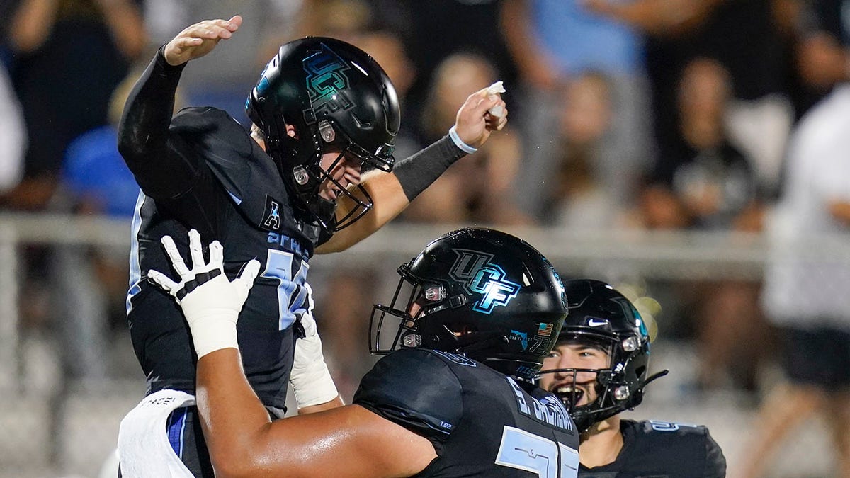 John Rhys Plumlee celebrates touchdown