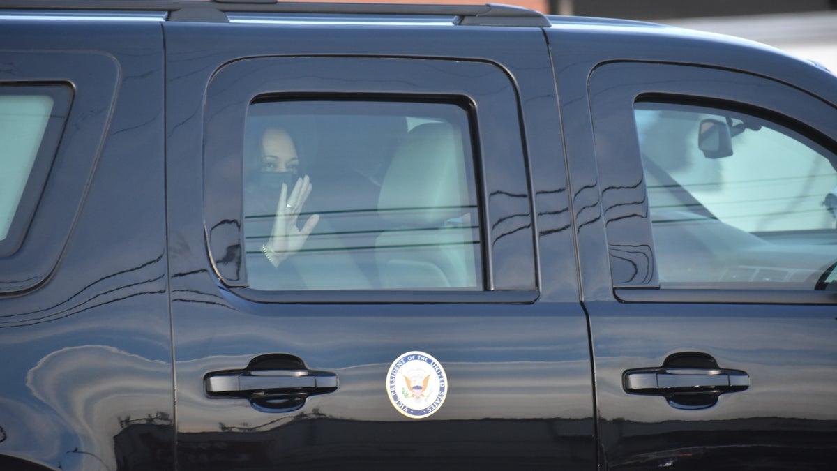 Kamala Harris rides in a Secret Service motorcade