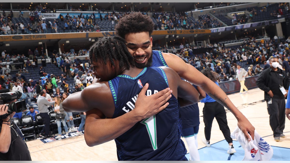 Karl-Anthony Towns hugs Anthony Edwards