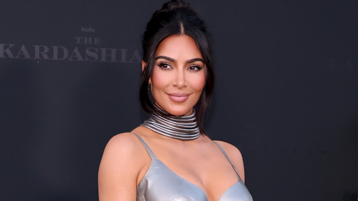 Kim Kardashian poses at red carpet premiere of new Hulu show