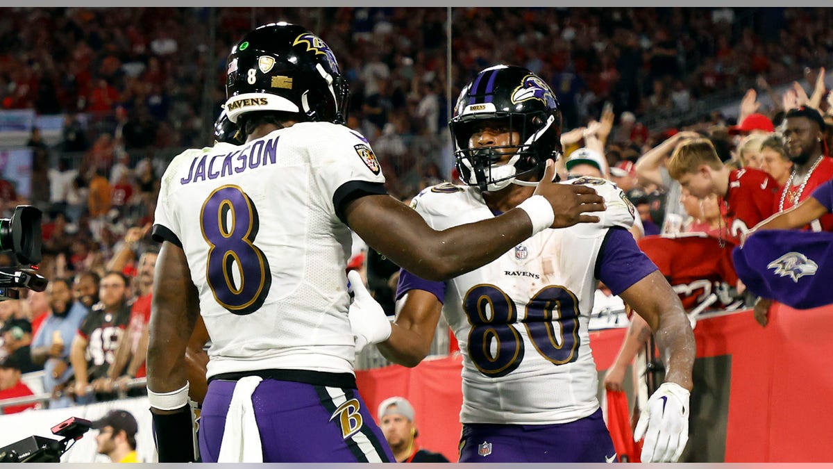 Lamar Jackson celebrates Isaiah Likely's touchdown