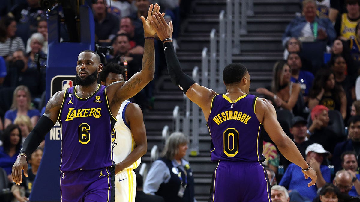 Lebron and Russell Westbrook high five