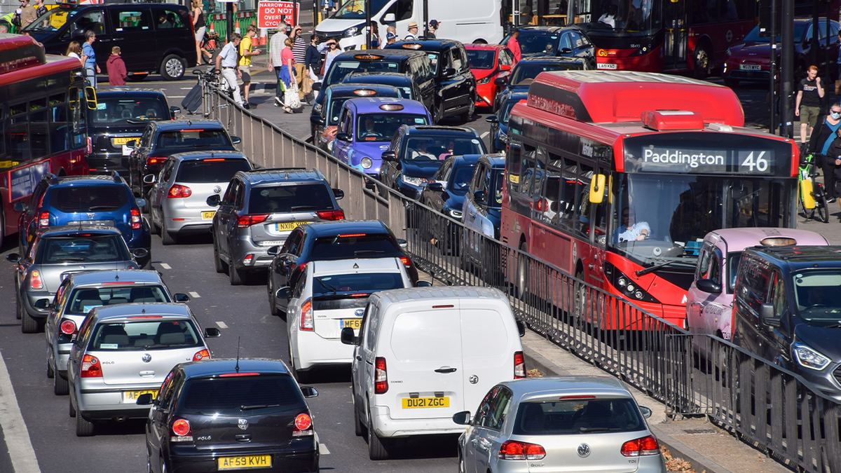 Photo shows traffic in London including a double-decker London bus