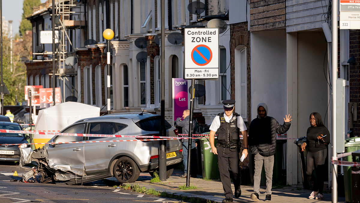 Crime scene investigators in London after shooting