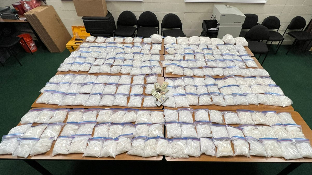 Bags of meth lined up on a table