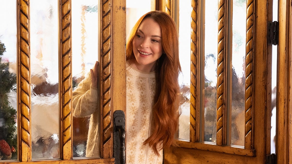 Lindsay Lohan smiles in a scene from "Falling For Christmas"
