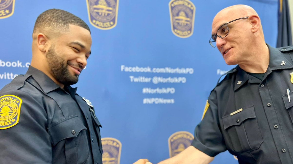 Norfolk police chief shakes hand of officer returning to force