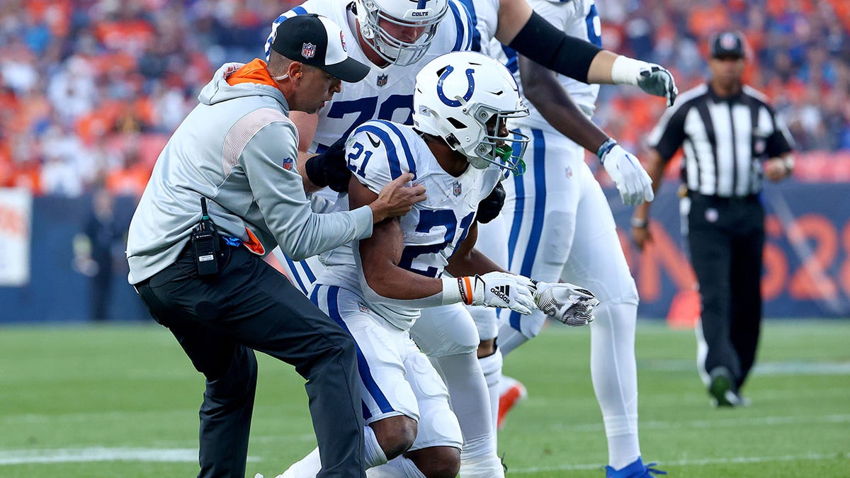 Nyheim Hines with trainer