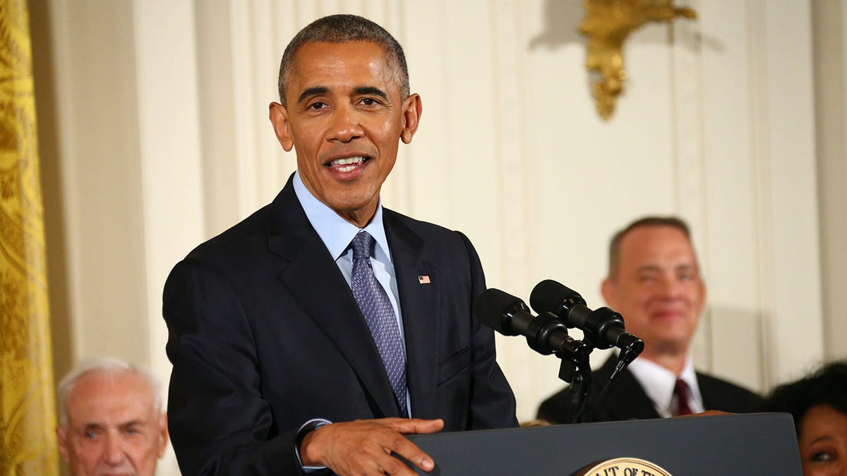 Obama speaks at podium