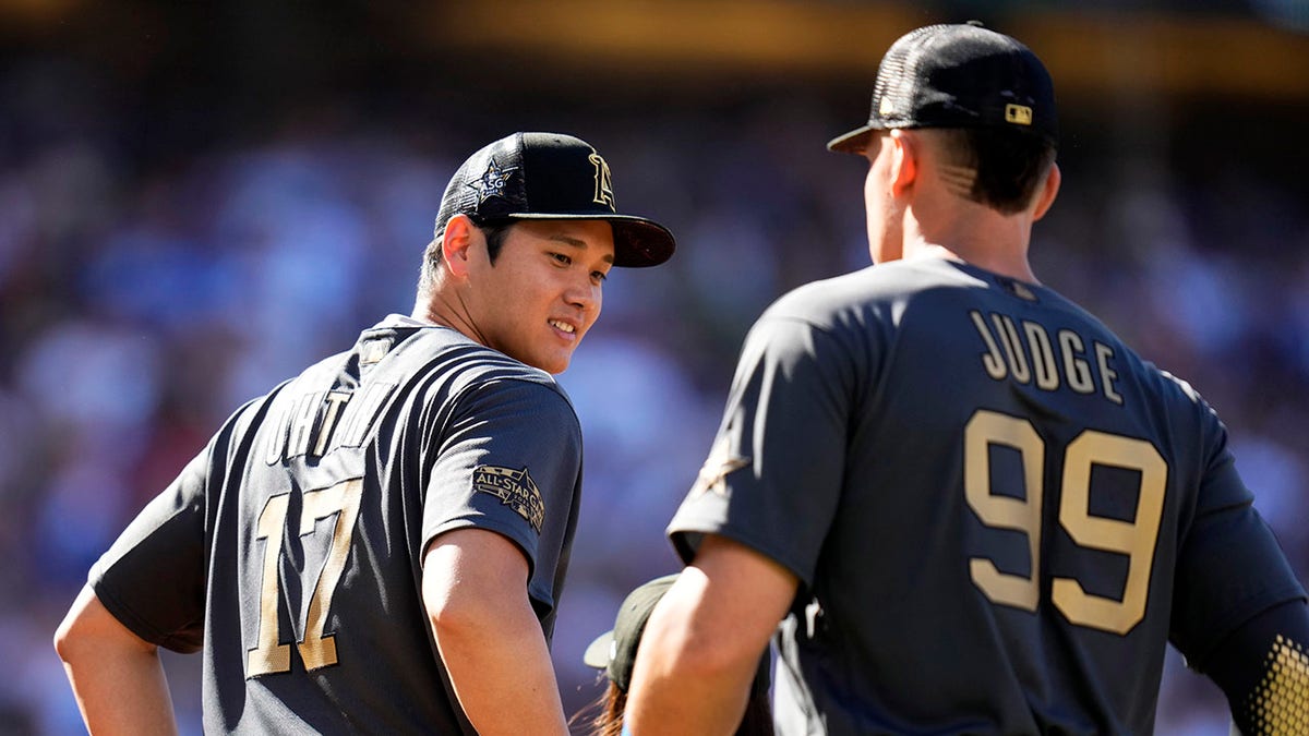 Shohei Ohtani looking back at Aaron Judge