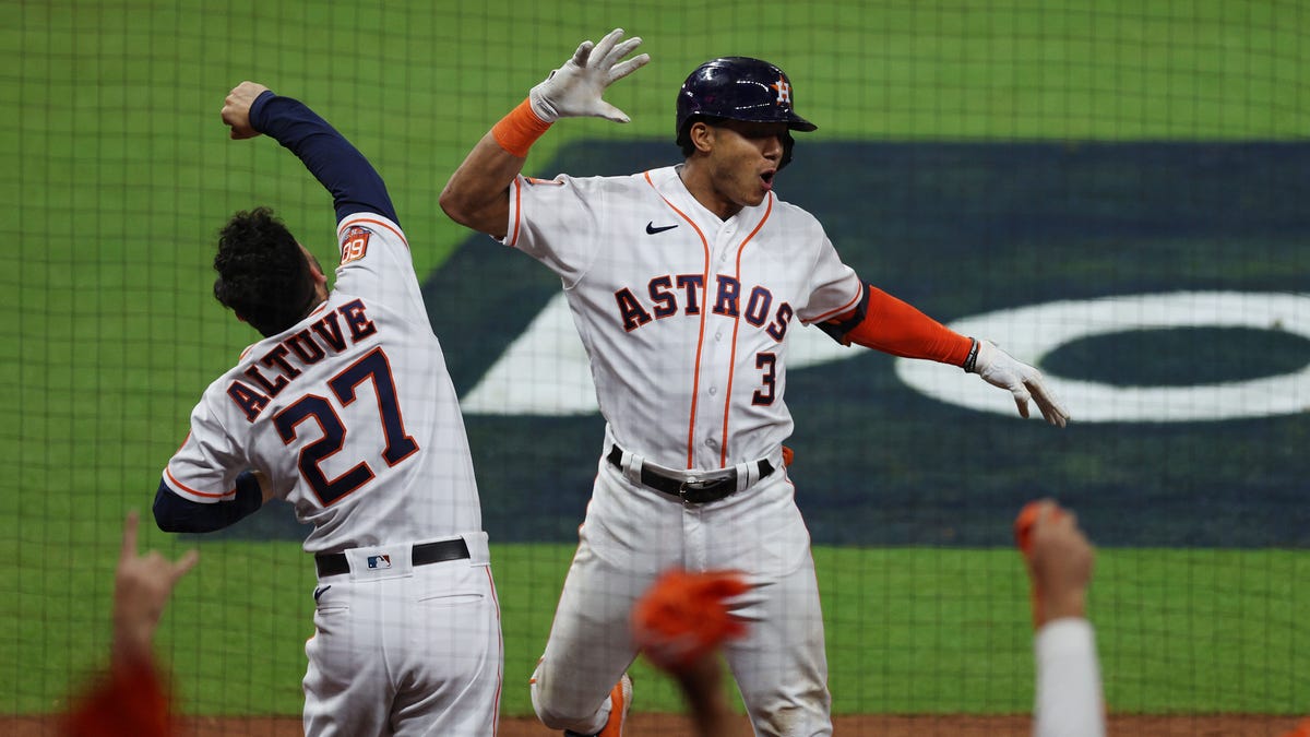 Jeremy Pena and Jose Altuve celebrate