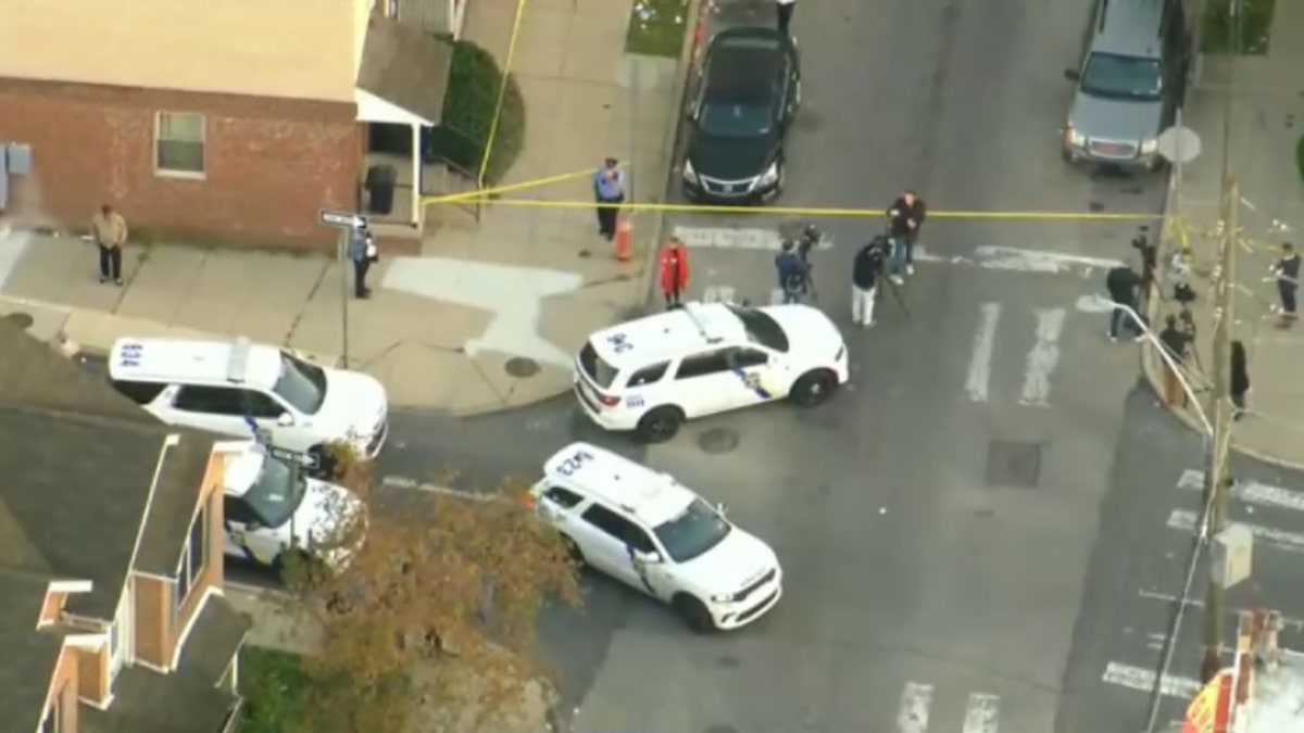 offices and police vehicles at intersection