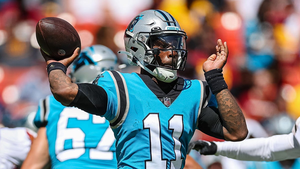 Carolina Panthers quarterback P.J. Walker (6) runs off the field against  the New York Giants during an NFL football game, Sunday, Oct. 24, 2021, in  East Rutherford, N.J. (AP Photo/Adam Hunger Stock