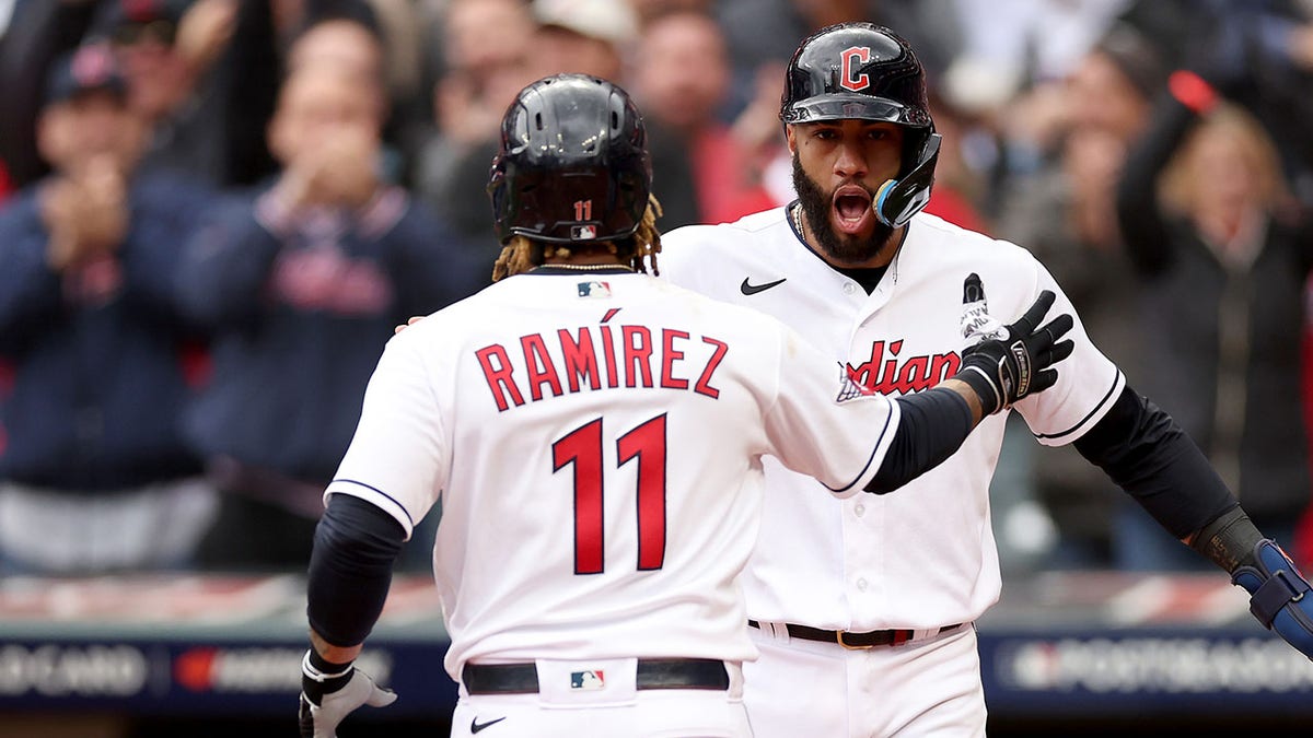 Jose Ramirez and Amed Rosario celebrate home run