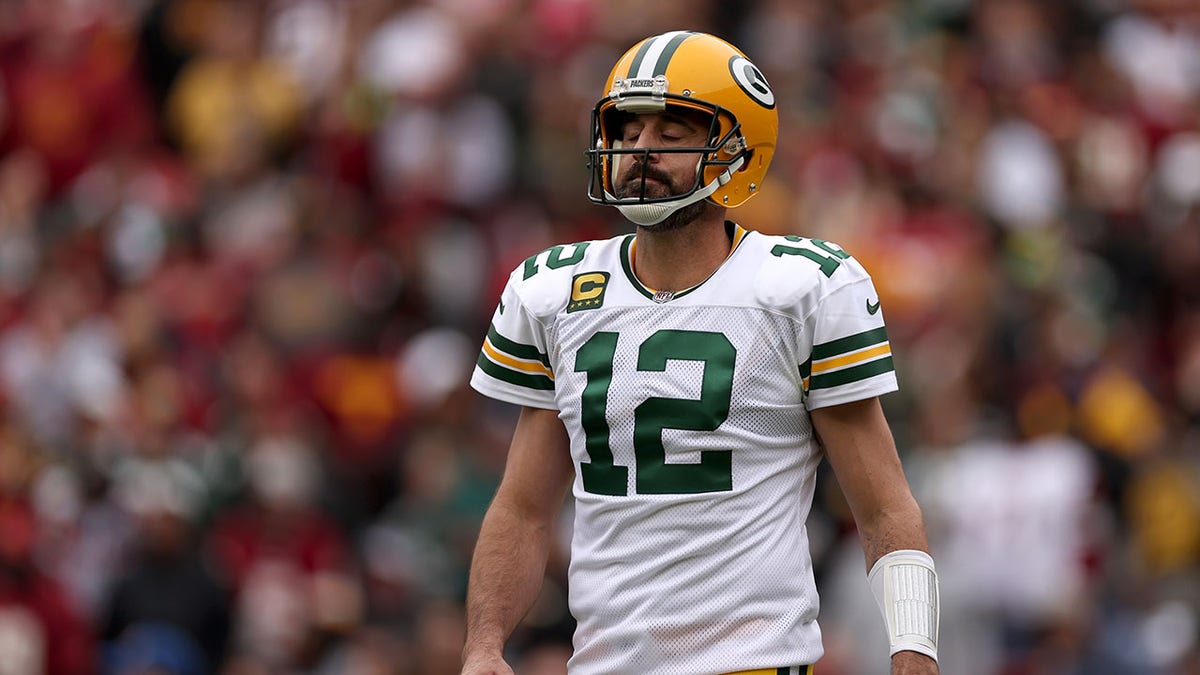 Aaron Rodgers eyes closed on field
