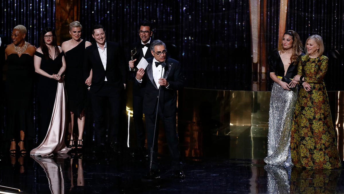 The cast of 'Schitt's Creek' accepts the Emmy for 'Outstanding Comedy Series' in 2020.