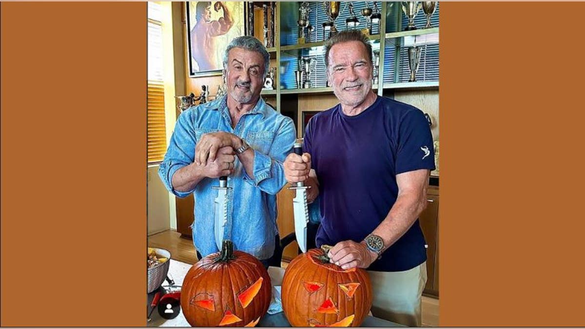 Arnold Schwarzenegger and Sylvester Stallone carving pumpkins