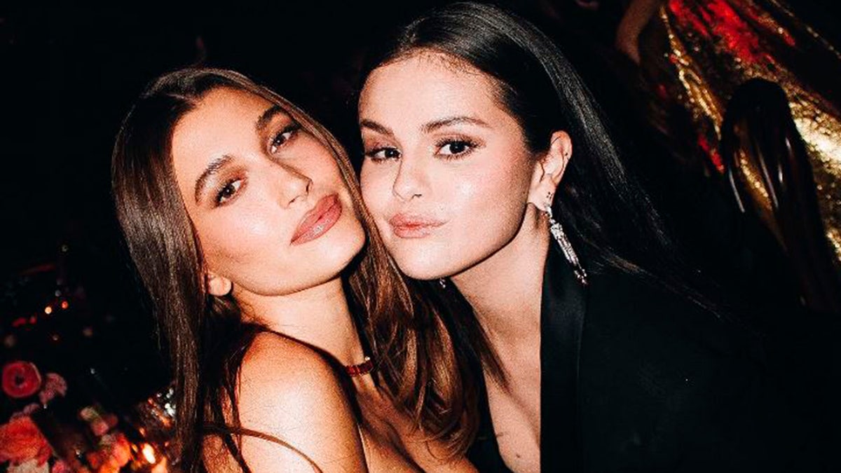 Selena Gomez and Hailey Bieber smile at event