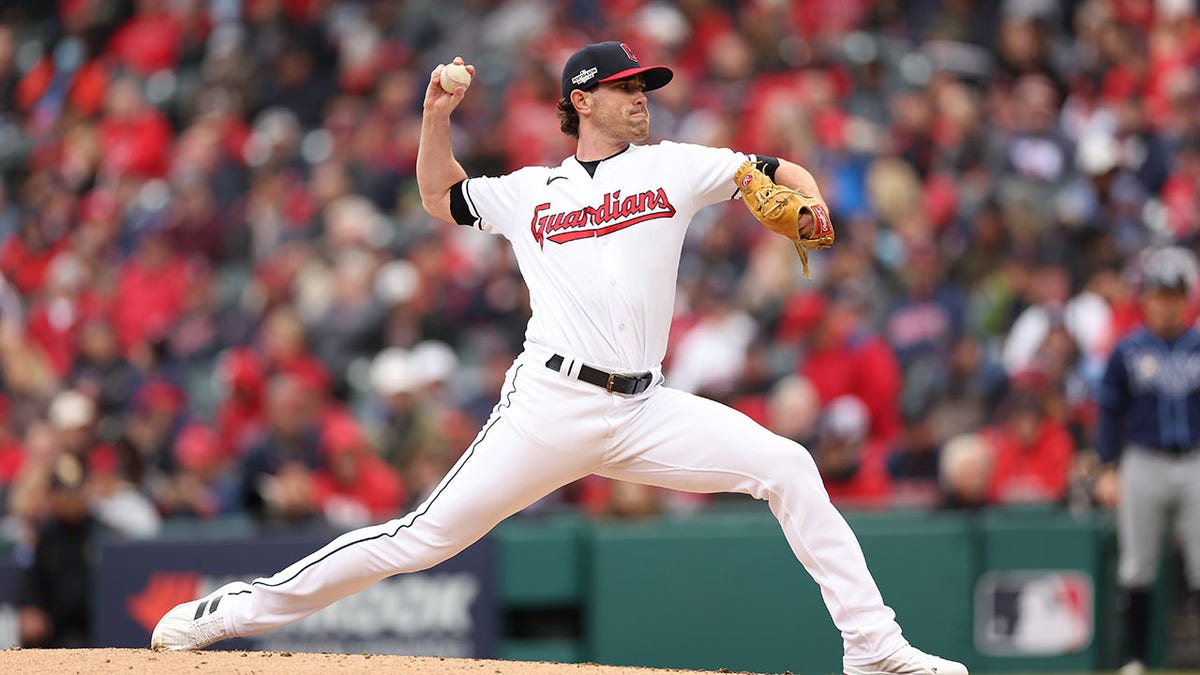 Shane Bieber throws pitch