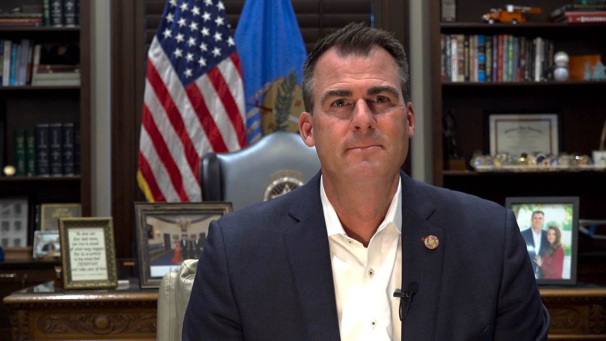 Gov. Stitt in his office