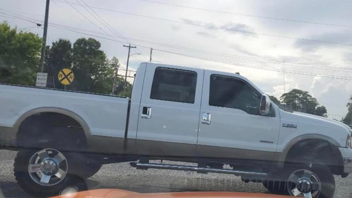 White Ford truck side