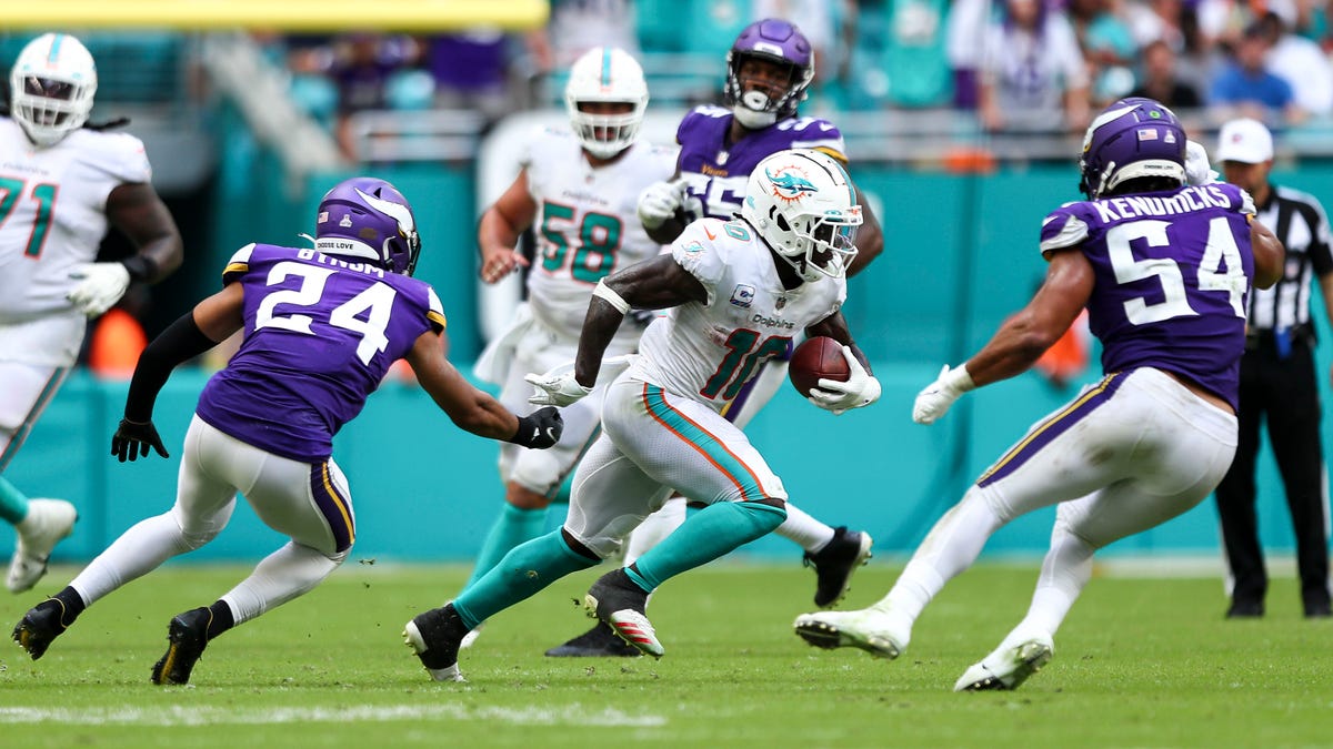 Tyreek Hill Miami Dolphins Unsigned Running The Ball Photograph