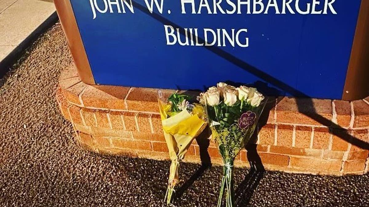 Flowers placed outside of a University of Arizona building