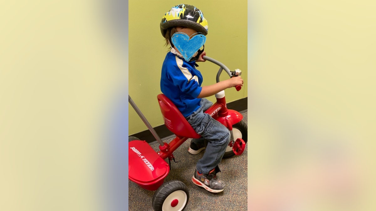 a boy gets a new bike from One Simple Wish