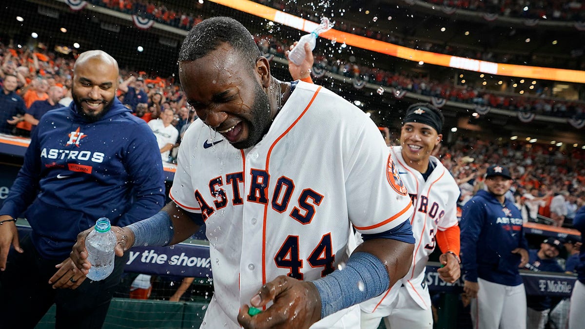 Yordan Alvarez gets water bath