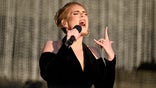 Adele sings on stage