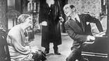 Scene from the movie 'The Jazz Singer'' - Jolson as Jakie Rabinowitz (r.), Eugenie Besserer as Sara Rabinowitz and Warner Oland as cantor Rabinowitz Directed by: Alan Crosland USA 1927 Produced by: Warner Bros. Pictures Vintage property of ullstein bild.