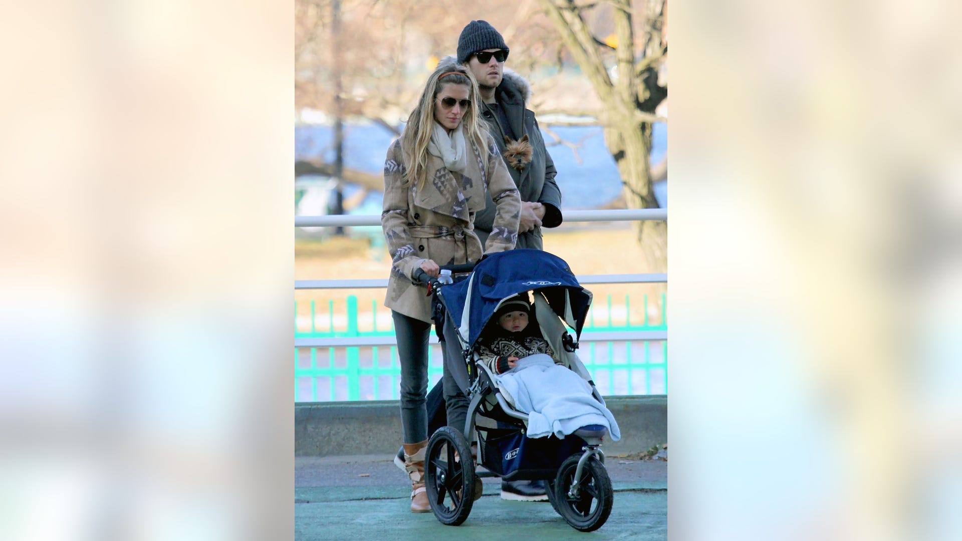 Tom and Gisele with son